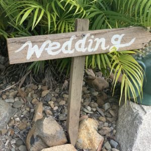 Wedding picket sign in garden