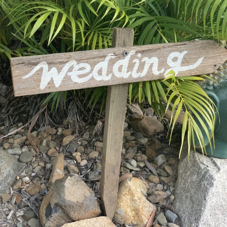 Wedding picket sign in garden